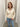 Pull polo femme à col fleuri et cœurs brodés