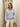Pull femme rayé à col zippé et manches longues