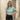 Crop top femme à sequins et col montant
